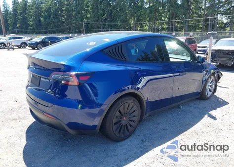 2022 Tesla Model Y Long Range Dual Motor All-Wheel Drive z USA, uszkodzony, nr VIN 7SAYGDEE0NF454724